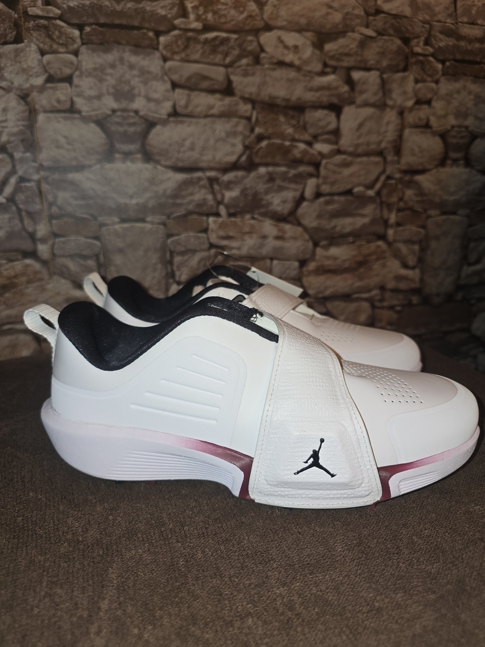 The Jordan Air Rev Golf in White/Team Red/Black shoes